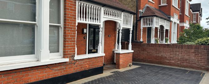 Completed block paved driveway outside a residential red-brick property in Eltham.