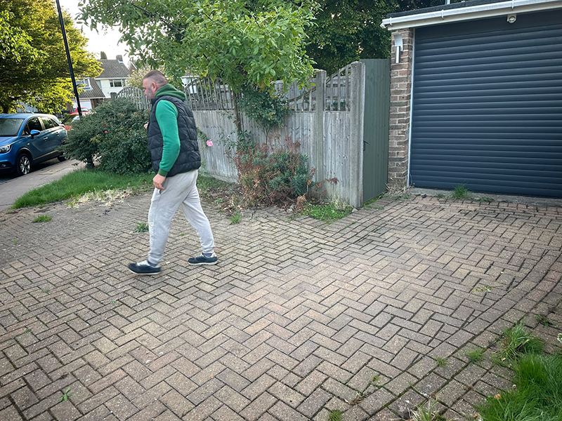 Existing block paved driveway and old fencing before resin, fencing and turfing work in Selsdon