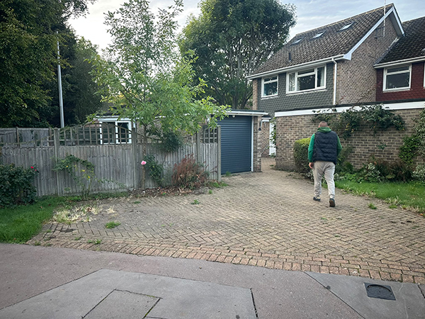 Wide view of existing block paved driveway before resin surfacing and fencing work in Selsdon